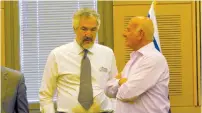  ?? (Courtesy) ?? Daniel Pipes (left) of the Middle East Forum stands with MK Yaakov Perry at the opening of the Knesset Israel Victory Caucus in this file photo.