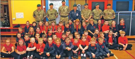  ?? Photograph: Kevin McGlynn ?? Royal Marine Commandos were warmly welcomed at Dunbeg Primary School.