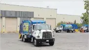  ?? JOHN RENNISON THE HAMILTON SPECTATOR ?? Trucks wait to enter the compost building at the city's resource recovery centre.