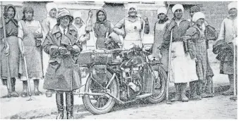  ?? ?? Women gather around Gwen and her New Imperial in Berlin in 1927.