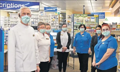  ??  ?? Short of staff: John Anderson, Barb Muller, Kellie Hastings, Sheen Chick, Renae Lowe, Antonella Loverso and Bella Lowe at Amcal Pharmacy on Tuesday.