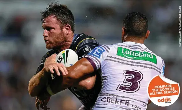  ??  ?? SHOCK DEFEAT: North Queensland’s Gavin Cooper is tackled by Manly’s Dylan Walker during the Cowboys’ surprise loss last weekend.