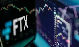  ?? Stefani Reynolds/AFP/Getty Images ?? ‘Complete failure of corporate controls’ … collapsed cryptocurr­ency exchange FTX. Photograph: