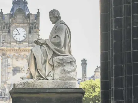  ??  ?? 0 Statues of Sir Walter Scott in Edinburgh’s Parliament House and elsewhere in the capital are a reminder of the Faculty of Advocates’ great heritage