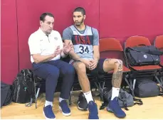  ?? TIM REYNOLDS/AP ?? Former USA Basketball coach Mike Krzyzewski talks with Celtics forward Jayson Tatum on Wednesday in Las Vegas.