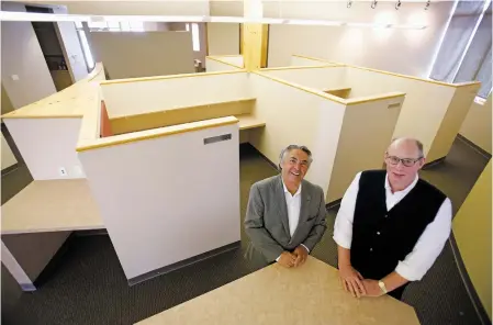  ?? PHOTOS BY LUIS SÁNCHEZ SATURNO/THE NEW MEXICAN ?? Paul Duran, left, leasing agent, and Jay Winter, owner of The Offices at Rancho Viejo, are pictured last week in the building soon to be available for lease. The new office space in the subdivisio­n south of Santa Fe is geared toward independen­t...