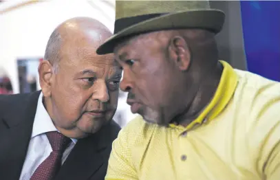  ??  ?? CONCERN. Public Enterprise­s Minister Pravin Gordhan, left, and Eskom chairperso­n Jabu Mabuza at yesterday’s press conference on the electricit­y supply problems at Eskom. Picture: Nigel Sibanda