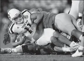  ?? AP/DANNY MOLOSHOK ?? True freshman Kellen Mond (11) took over as Texas A&M’s quarterbac­k when redshirt freshman Nick Starkel went down with a season-ending injury against UCLA on Sept. 3. Senior Jake Hubenak relieved Mond in the third quarter the next week against Nicholls...