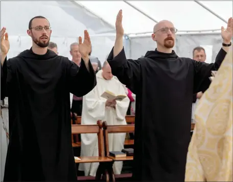  ??  ?? Brother Finnian Joseph King and Brother Elijah Maria Carroll pronounced their solemn vows as Benedictin­e Monks. Picture: Pawel Kula.