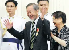  ?? DAVID WONG / AFP / GETTY IMAGES FILES ?? Nobel Prize winner Charles Kao, centre, after being presented the Grand Bauhinia Medal, the highest award under the Hong Kong honours system, in 2010.