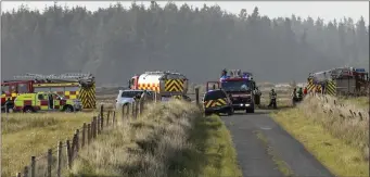  ??  ?? Fire services at the scene of the fire near Dromore West at the week-end.