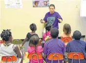  ?? PHOTO PROVIDED ?? Teacher Spring Bruins instructs a group of children as part of a Reaching Our City community program.