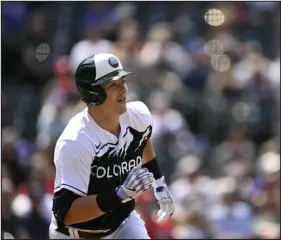  ?? RJ SANGOSTI — THE DENVER POST ?? Colorado’s Michael Toglia is among the players getting a shot at playing first base after the trade of veteran C.J. Cron on Sunday.