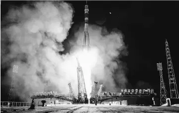  ??  ?? Russia’s Soyuz MS-06 spacecraft carrying the members of the Internatio­nal Space Station (ISS) expedition 53/54 blasts off from the launch pad to the Internatio­nal Space Station (ISS) early. — AFP photo