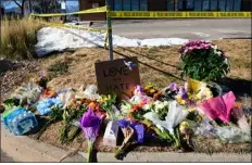  ?? HELEN H. RICHARDSON — THE DENVER POST ?? A makeshift memorial is set up near Club Q in November 2022, in Colorado Springs, where officials said an attacker opened fire in the gay nightclub late Saturday night, killing five people and wounding at least 25.