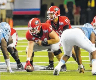  ?? ANDY HARRISON/UNIVERSITY OF GEORGIA ?? Georgia graduate transfer quarterbac­k Greyson Lambert started the opening win over North Carolina, and he finished the game against the Tar Heels and also finished last Saturday’s game against Nicholls State.