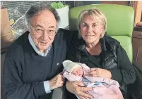  ??  ?? Barry and Honey Sherman are shown with a grandchild in this photo taken shortly before they died in December 2017.