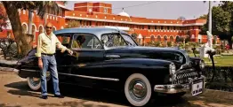  ?? — PTI ?? Manujendra Shah of the erstwhile princely state of Tehri-Garhwal is seen with a 1947 Buick in New Delhi. The vintage car was recently sold by him.