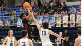  ?? (Special to The Commercial/Jamie Hooks) ?? Jai’Chaunn Hayes of White Hall pulls up for a jumper surrounded by Sheridan’s defense Tuesday at Yellowjack­et Arena in Sheridan.