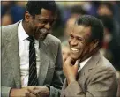  ?? MIKE KULLEN — THE ASSOCIATED PRESS FILE ?? Former Celtics teammates Bill Russell, Sacramento Kings coach, left, and K.C. Jones, Celtics coach, meet before a game in 1988.