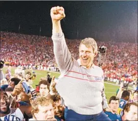  ?? Eric Risberg Associated Press ?? GIANTS COACH Bill Parcells is carried off the Rose Bowl field after New York defeated Denver in 1987. Maybe Leon Uris, a Broncos fan, couldn’t handle it.