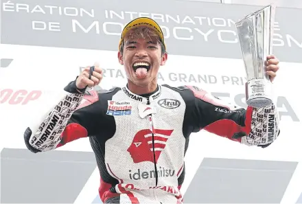  ?? ?? Thai rider Somkiat Chantra, a member of Honda Team Asia, celebrates on the podium after winning the Indonesian Moto2 Grand Prix last year.