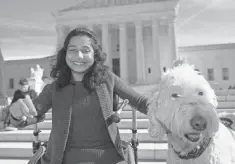  ?? MOLLY RILEY, AP ?? Ehlena Fry and her service dog, Wonder, won a unanimous decision against her school district at the Supreme Court.