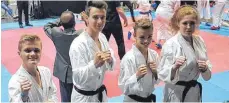  ?? FOTO: PRIVAT ?? Charles Sampson, Niko Moosherr, Alexander Salscu und Elena Jakob (von links) bei der Karate-WM in Athen.