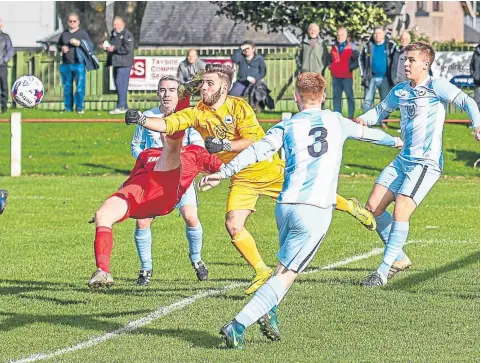  ??  ?? East Craigie (light blue) beat Lochee United on their way to Sunday’s GA Engineerin­g Cup Final against Carnoustie.