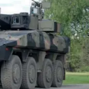  ??  ?? Le 8 × 8 Boxer, en version de combat d’infanterie, doté d’une tourelle Lance. (© Artec)