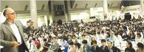  ??  ?? Mitch Carson speaking to a crowd last year in Tokyo. Japan with 5,800 attendees proving the lucrative power of internatio­nal speaking