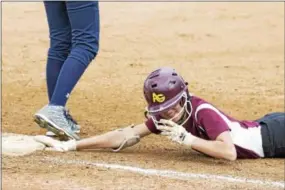  ?? RACHEL WISNIEWSKI — FOR DIGITAL FIRST MEDIA ?? Mack VanSciver slides safe into first base during Avon Grove’s PIAA Class 6A tournament opener against Council Rock North Monday at Spring-Ford.