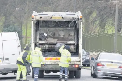  ??  ?? > Birmingham refuse collectors will now strike for three hours each day until September