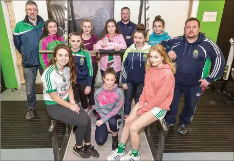  ?? Picture: John Delea. ?? A delighted U16’s selection of the Macroom Ladies Football Team with Club PRO Brian Gallagher (left) & Club Chairperso­n Martin O’Brien (right) who were recently sponsored by Gym owner, Paul Cronin (rear) of Innovation­s Gym, Millstreet Road, Macroom,...