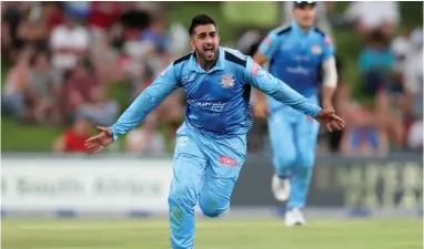  ??  ?? TWIRLING WITH DELIGHT: The Titans’ Tabraiz Shamsi grabbed four wickets in an influentia­l bowling display.