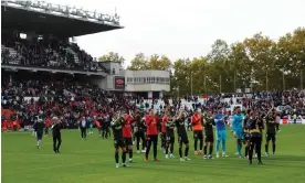  ?? Photograph: Óscar del Pozo/AFP/Getty Images ?? Girona's players celebrate at the end of their win over Rayo Vallecano.