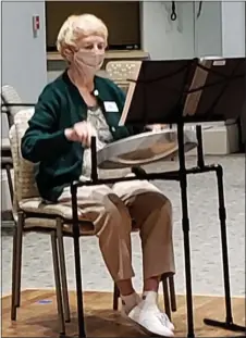  ?? COURTESY OF BRITTANY POINTE ESTATES ?? Kay Ewer is one of the residents of Brittany Pointe Estates who is learning to play the steel drum.