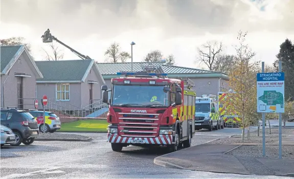  ?? Picture: Paul Reid. ?? Emergency services at the scene of the fire at Stracathro Hospital.