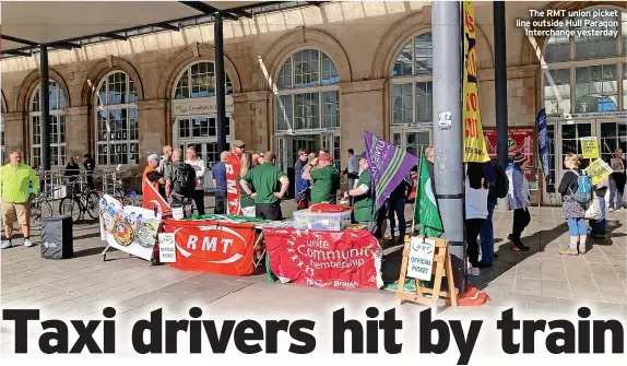  ?? ?? The RMT union picket line outside Hull Paragon Interchang­e yesterday