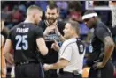  ?? BRANDON DILL — THE ASSOCIATED PRESS FILE ?? In this file photo, Memphis Grizzlies forward Chandler Parsons (25), center Marc Gasol (33) and forward Zach Randolph (50) talk with referee Monty McCutchen during the first half of the team’s NBA basketball game against the Phoenix Suns in Memphis,...