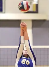  ?? Katharine Lotze/ The Signal (More photos on signalscv.com) ?? Valencia’s Kelsey Knudsen hits the ball backward against West Ranch on Tuesday at Valencia High.