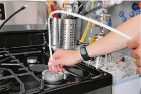  ?? PSE Healthy Energy/Associated Press ?? A gas stove is tested for benzene in California. Stoves in California homes are leaking the cancer-causing gas benzene, researcher­s found in a new study.