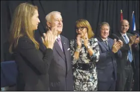  ?? MArk GouDGe/SALtWIre NetWork ?? Brian Mulroney is applauded by his daughter Caroline and wife Dr. Mila Mulroney after his speech during sod turning for the Brian Mulroney Institute of Government and Mulroney Hall building at StFX Wednesday.
