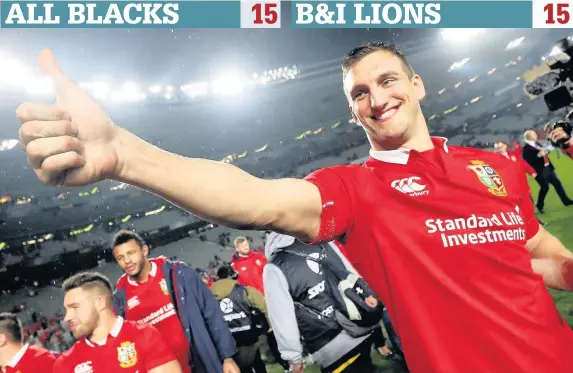  ??  ?? Lions skipper Sam Warburton salutes the travelling support after a breathless final Test in Auckland, which left the series level