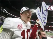  ?? CURTIS COMPTON — THE ASSOCIATED PRESS ?? Quarterbac­k Mac Jones, left, and unbeaten Alabama take on Notre Dame in a College Playoff semifinal game Jan. 1.