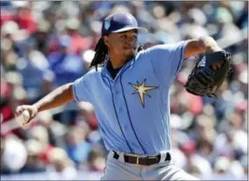  ?? JOHN RAOUX - THE ASSOCIATED PRESS ?? Tampa Bay Rays’ Chris Archer pitches against the Philadelph­ia Phillies in the first inning of a spring baseball exhibition game, Tuesday, March 13, 2018, in Clearwater, Fla.