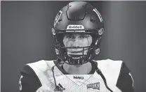  ?? JOE CAMPOREALE /USA TODAY SPORTS ?? Northern Arizona quarterbac­k Case Cookus takes the field prior to facing Arizona at Arizona Stadium in Tucson on Sept. 2.