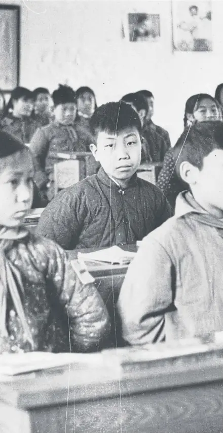  ?? ?? Children in a Beijing classroom in 1959, where the education they received was very selective, main; author Xinran, below left