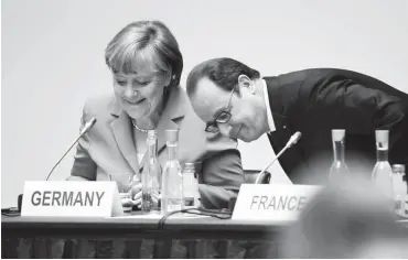  ?? Foto: AFP/Tobias Schwarz ?? Kanzlerin Merkel und Präsident Hollande beim Petersberg­er Klimadialo­g