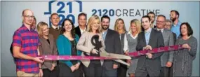  ??  ?? The digital marketing team at 2120 Creative led by Brandon & Heather Steiger (center), were honored with a ribbon-cutting ceremony by the Exton Regional Chamber of Commerce.